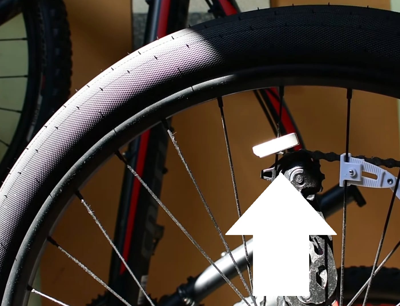 Put a piece of magnet on the magnet on the electric bike wheel to reflect the polarity of the magnet