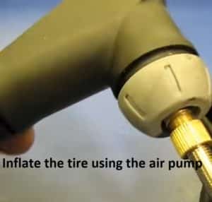 Inflate the tire using the air pump