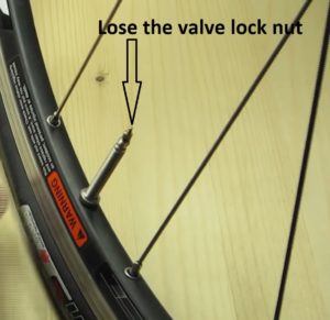 Lose the valve lock nut 