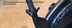 Place the seat post into a position where it matches your height then lock the handle