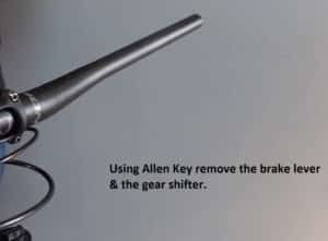 Using Allen Key remove the brake lever & the gear shifter.