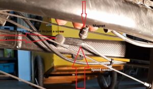 Using a screw loosen the agent & realign it opposite to the speed sensor.